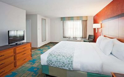 King bed at Norwood Inn & Suites Merrillville.