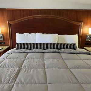King bed at Casa Rosa Inn.
