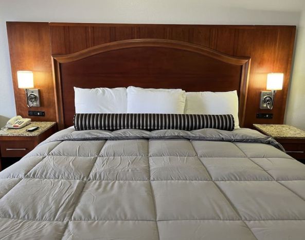 King bed at Casa Rosa Inn.