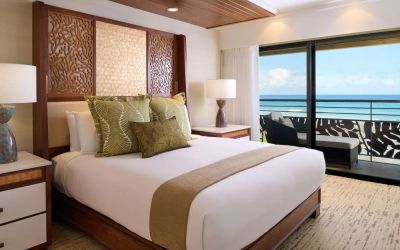 King bed at Ko'a Kea Resort On Po`ipu Beach.