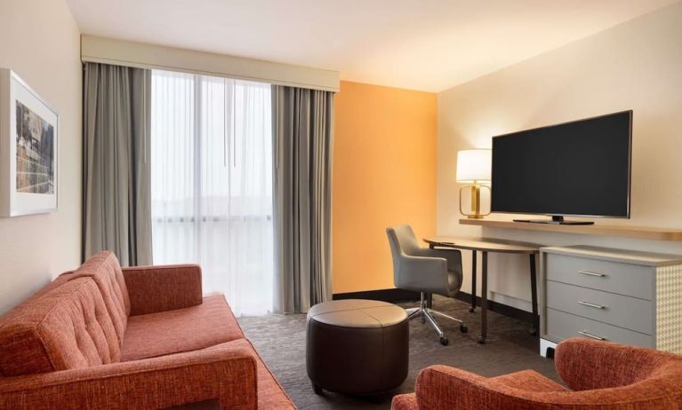 Lounge and TV at DoubleTree By Hilton Fort Worth South.