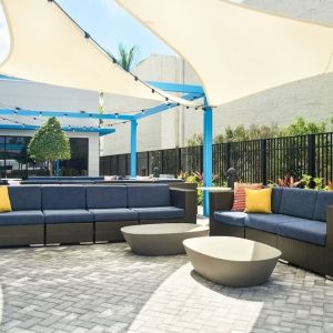 Outdoor seating at Tru By Hilton Ft. Lauderdale Airport.