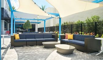 Outdoor seating at Tru By Hilton Ft. Lauderdale Airport.