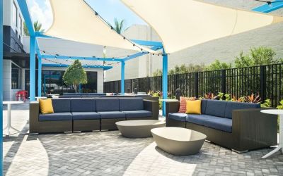 Outdoor seating at Tru By Hilton Ft. Lauderdale Airport.