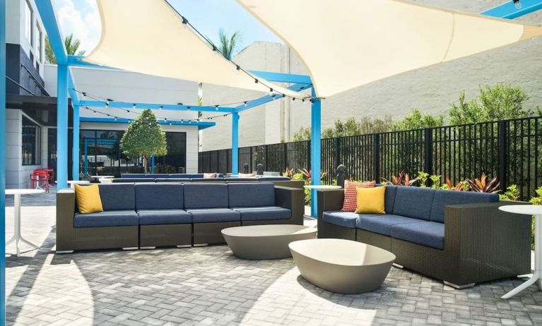 Outdoor seating at Tru By Hilton Ft. Lauderdale Airport.