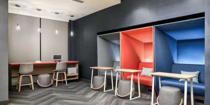 Coworking pods at Tru By Hilton Ft. Lauderdale Airport.