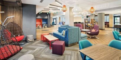 Coworking lounge at Tru By Hilton Ft. Lauderdale Airport.