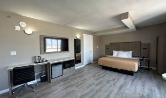 Day use room with work desk at Regal Inn & Suites New York.