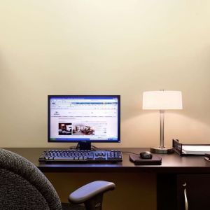 Business center with computer, printer and ergonomic chair at Hilton Orrington/Evanston.
