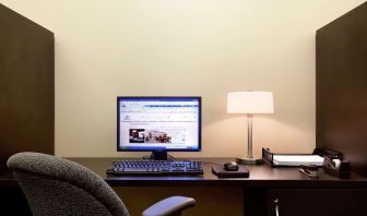 Business center with computer, printer and ergonomic chair at Hilton Orrington/Evanston.