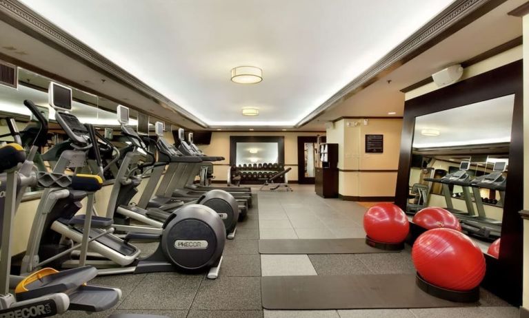Well equipped fitness center at Hilton Orrington/Evanston.