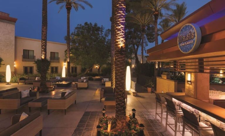 Hotel patio and pool bar at Hilton Scottsdale Resort & Villas.