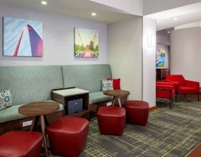 Lobby workspace with comfortable seating and printer at Hampton Inn & Suites St. Louis At Forest Park.