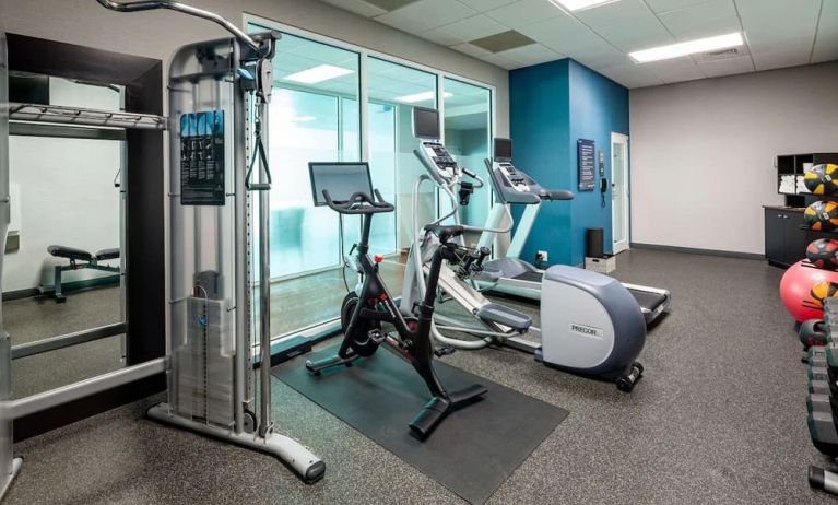 Fully equipped fitness center at Hampton Inn & Suites St. Louis At Forest Park.
