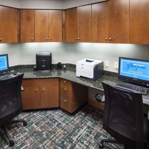 Business center with computers, printer and ergonomic chairs at Hampton Inn Los Angeles-Orange County-Cypress.