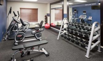 Fully equipped fitness center at Hampton Inn Los Angeles-Orange County-Cypress.