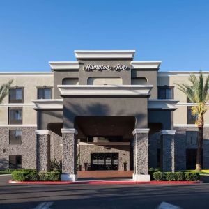 Entrance and parking area at Hampton Inn Los Angeles-Orange County-Cypress.