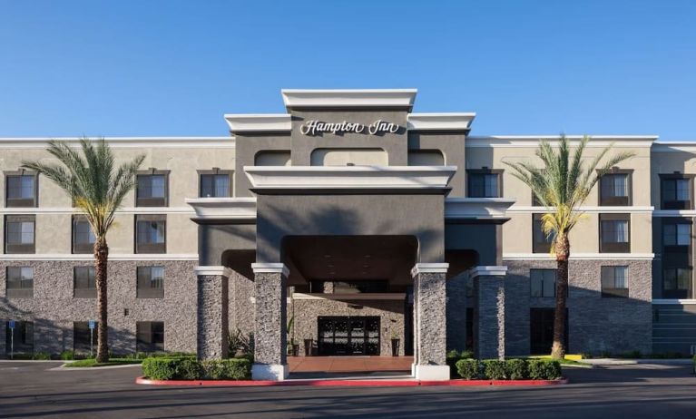 Entrance and parking area at Hampton Inn Los Angeles-Orange County-Cypress.