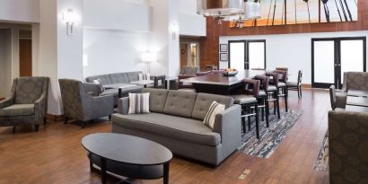 Lobby lounge and workspace at Hampton Inn Los Angeles-Orange County-Cypress.