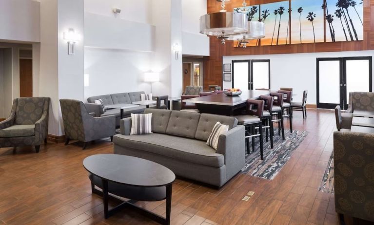 Lobby lounge and workspace at Hampton Inn Los Angeles-Orange County-Cypress.