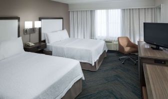 Day use twin room with natural light, work desk, TV screen and private bathroom at Hampton Inn Los Angeles-Orange County-Cypress.
