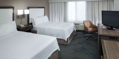 Day use twin room with natural light, work desk, TV screen and private bathroom at Hampton Inn Los Angeles-Orange County-Cypress.
