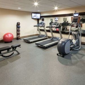 Fully equipped fitness center at Homewood Suites By Hilton Agoura Hills.