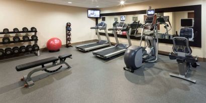 Fully equipped fitness center at Homewood Suites By Hilton Agoura Hills.