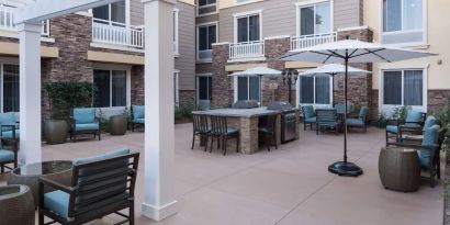 Outdoor lounge area at Homewood Suites By Hilton Agoura Hills.