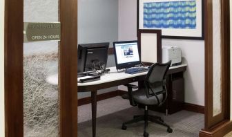 Business center with computers, printer and ergonomic chairs at Homewood Suites By Hilton Agoura Hills.