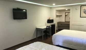 Queen beds with TV at Star Inn Hotel Sea World.