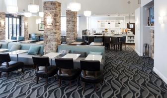 Dining area with comfortable seating perfect for coworking at Homewood Suites By Hilton San Jose Airport-Silicon Valley.