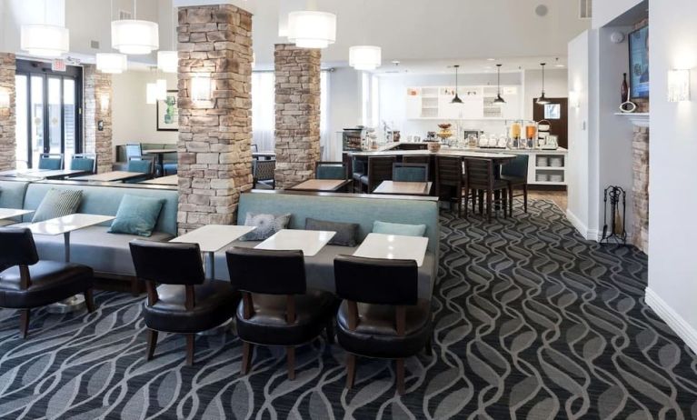Dining area with comfortable seating perfect for coworking at Homewood Suites By Hilton San Jose Airport-Silicon Valley.