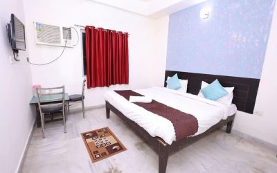 King room at Hotel NoVo Agra.