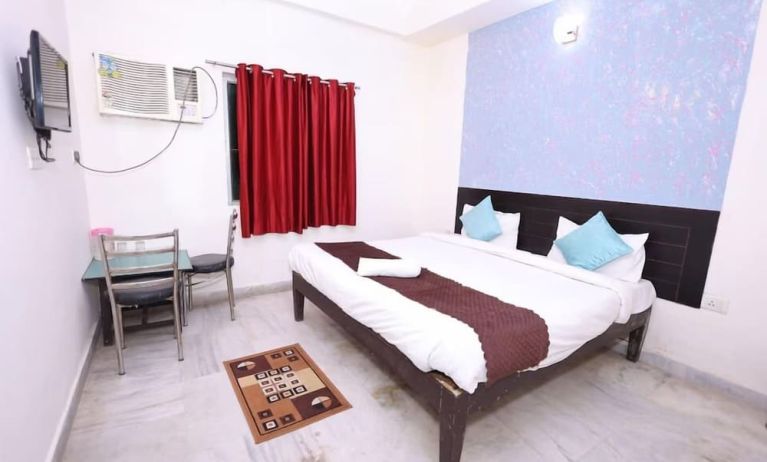 King room at Hotel NoVo Agra.