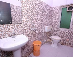 Guest bathroom at Hotel NoVo Agra.