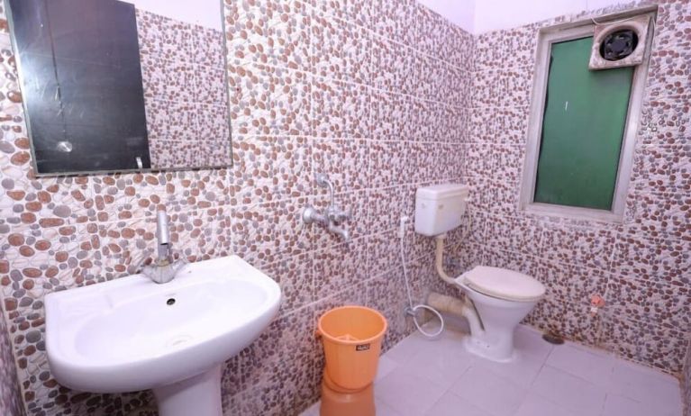 Guest bathroom at Hotel NoVo Agra.