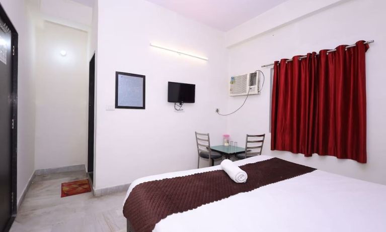 King room at Hotel NoVo Agra.