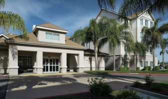 Entrance and parking area at Homewood Suites By Hilton Fresno Airport/Clovis.