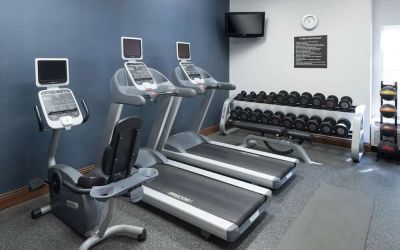 Well equipped fitness center at Homewood Suites By Hilton Fresno Airport/Clovis.