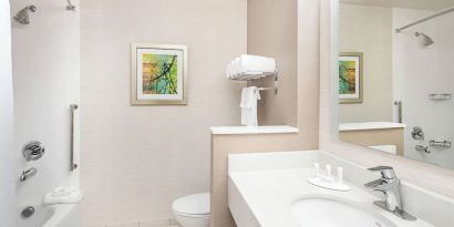Guest bathroom with shower at Fairfield Inn & Suites By Marriott North Bergen.
