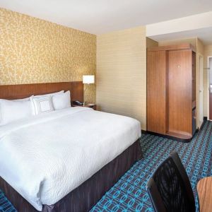 King room with work desk and TV at Fairfield Inn & Suites By Marriott North Bergen.