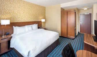 King room with work desk and TV at Fairfield Inn & Suites By Marriott North Bergen.
