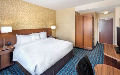 King room with work desk and TV at Fairfield Inn & Suites By Marriott North Bergen.