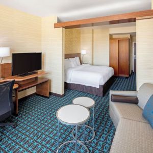 King room with work desk and TV at Fairfield Inn & Suites By Marriott North Bergen.