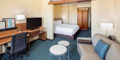 King room with work desk and TV at Fairfield Inn & Suites By Marriott North Bergen.
