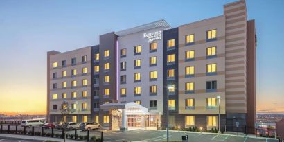 Parking and hotel exterior at Fairfield Inn & Suites By Marriott North Bergen.