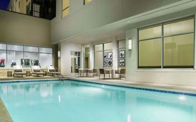 Outdoor pool with lounge chairs at Hilton Garden Inn Sunnyvale.