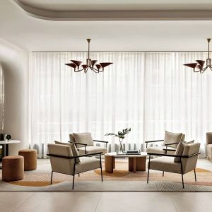 Lobby lounge and workspace at Kimpton Theta New York - Times Square.