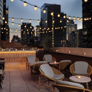 Terrace lounge area at Kimpton Theta New York - Times Square.